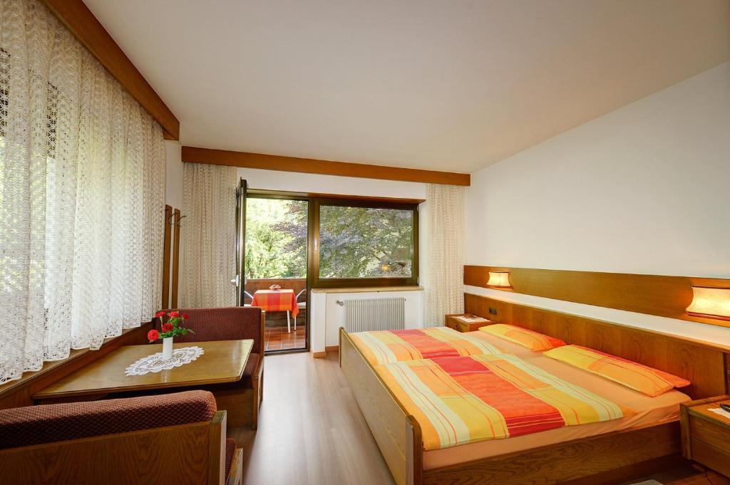 Apparthotel Taufenbrunn Parcines Camera foto